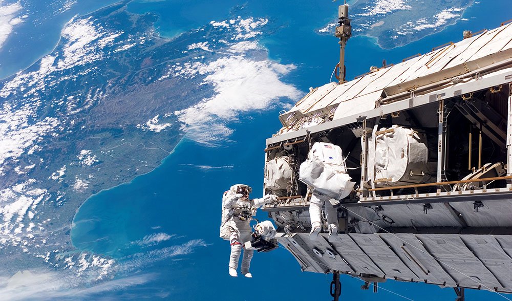 Astronauts outside the International Space Station