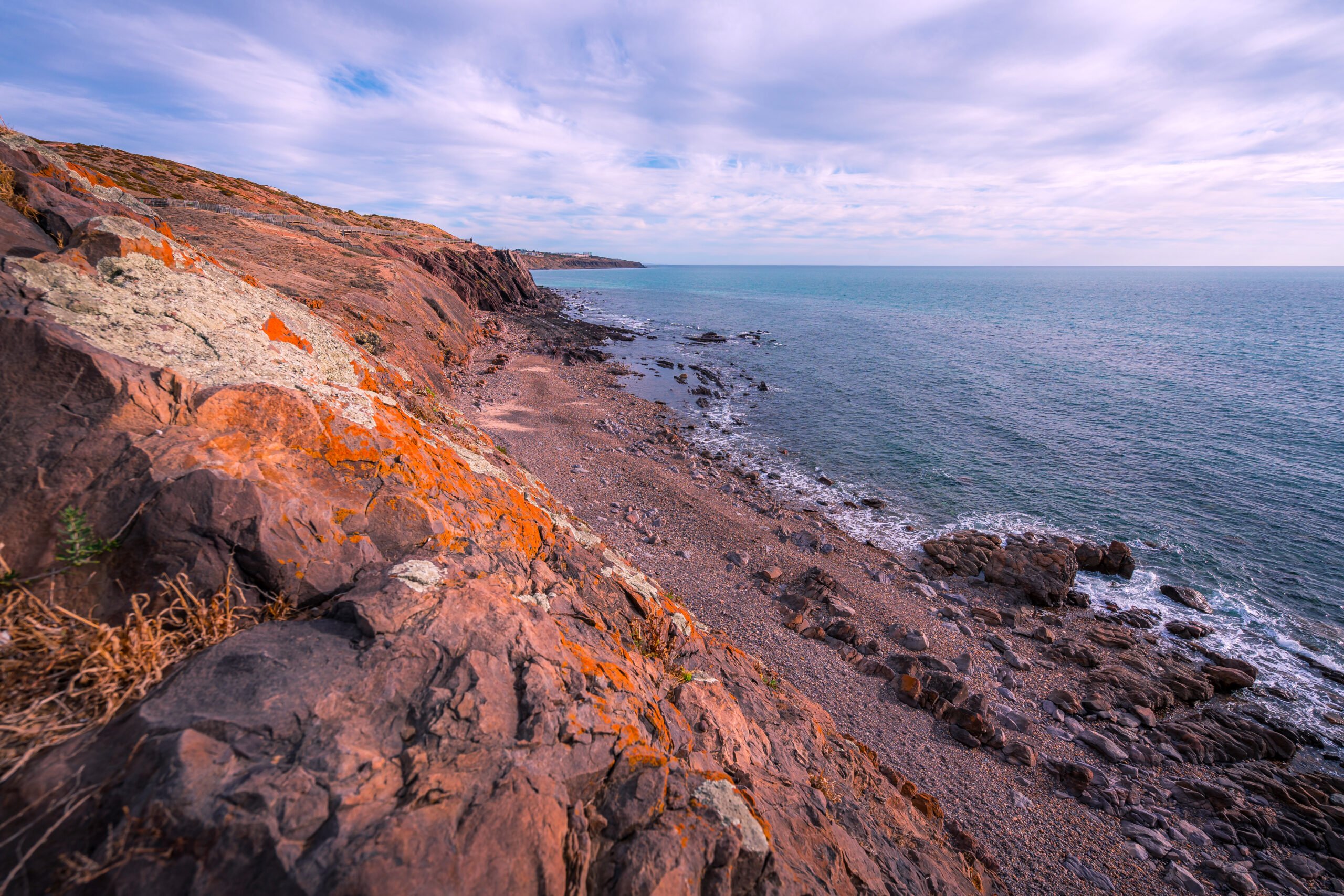 Why does South Australia have pink sand beaches?